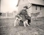 Farmer With Calf