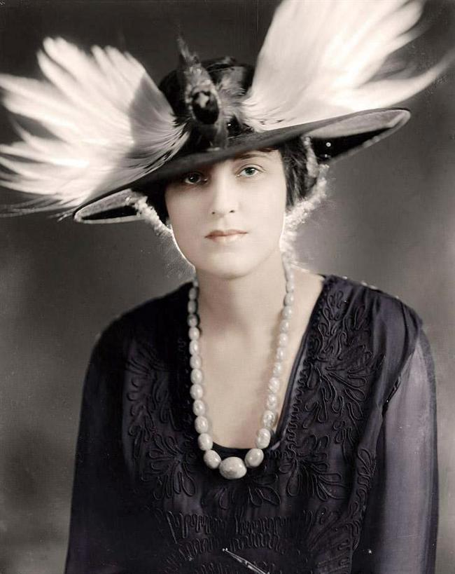 Woman in Feathered Hat
