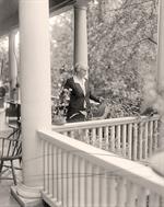 Mrs. Hoover Tending Flowers