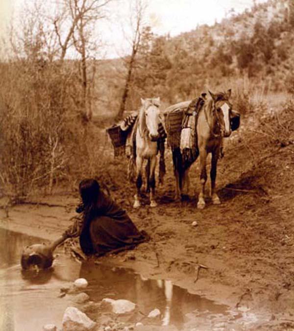Apache Woman Getting Water