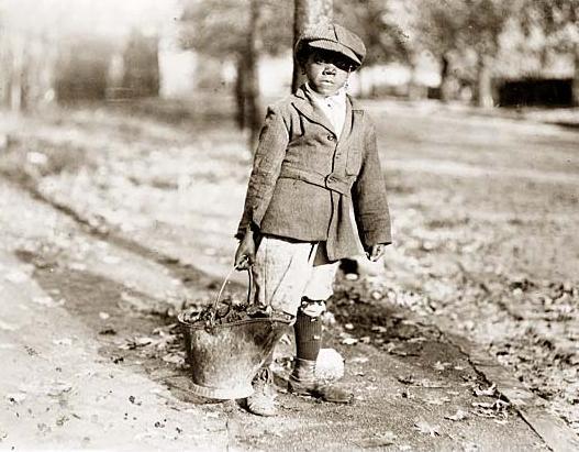 Black Boy Carrying Coal