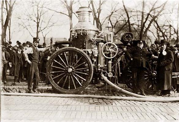 Two firemen with fire