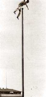 Man on Flag Pole